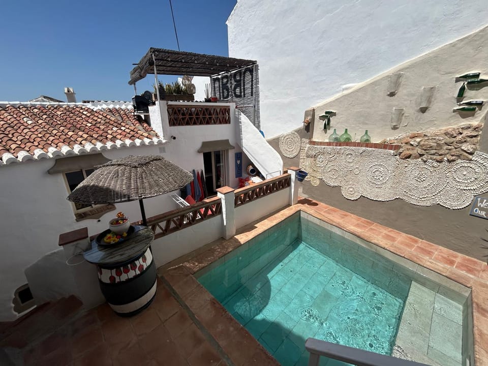 Property building, Patio, Pool view, Swimming pool, group of guests