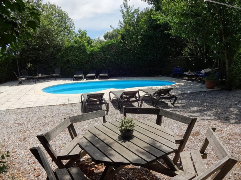 Property building, Living room, Swimming pool