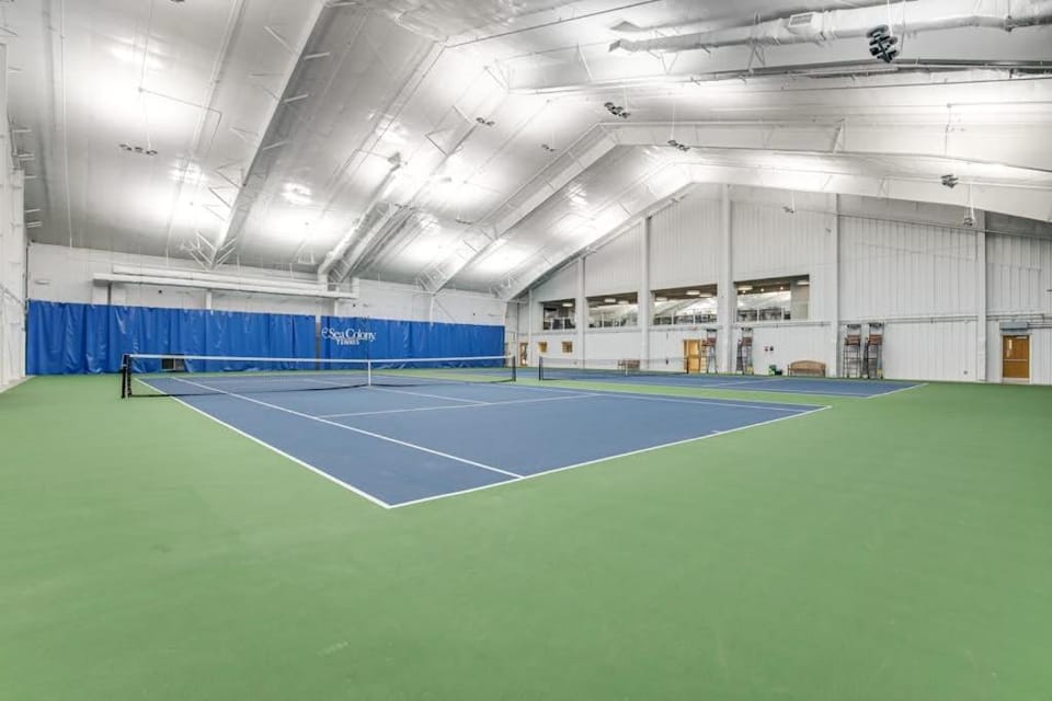 Sea Colony 5th floor condo with shared basketball court & sauna partial ocean view House in Sussex County