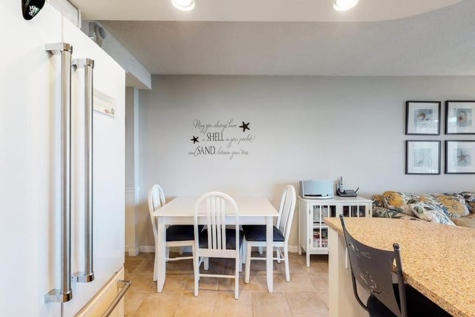 Sea Colony 3rd floor condo with elevator shared tennis court & gym with an ocean view House in Sea Colony