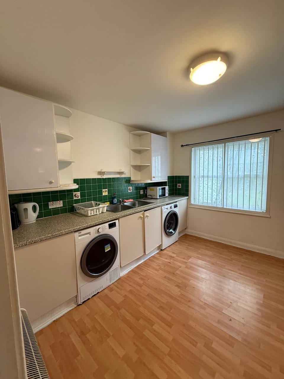 microwave, stove, washing machine, dryer, kitchen