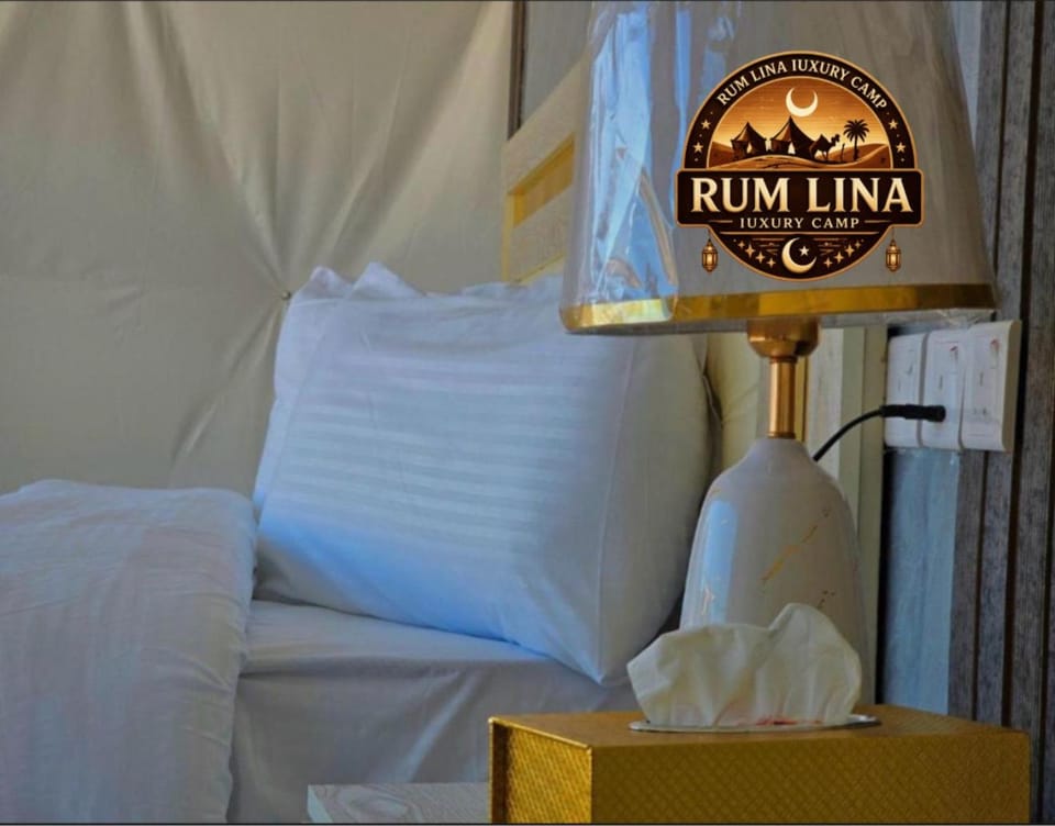 Bed, Property logo or sign, Photo of the whole room, Logo/Certificate/Sign, Bedroom, Text overlay