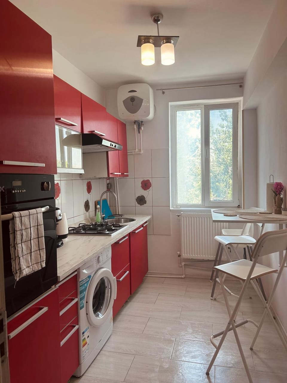 Kitchen or kitchenette, Dining area, oven, stove, washing machine