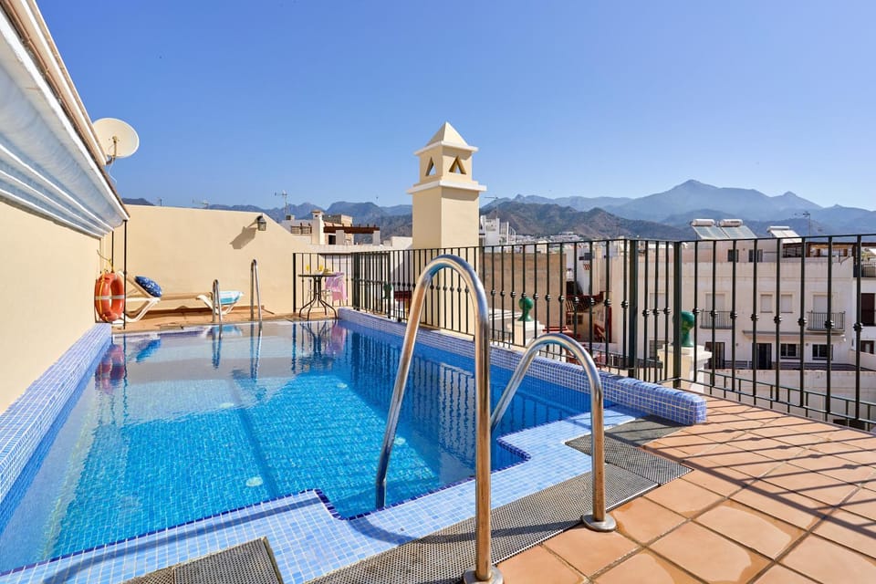 Property building, Living room, Swimming pool