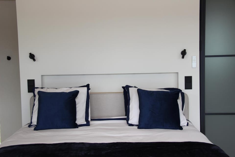 'Slapen aan het ven' lodge met jacuzzi - ontbijt - minibar - privétuin - privacy - waanzinnig uitzicht - beschermd natuurgebied Nature lodge in Nijmegen