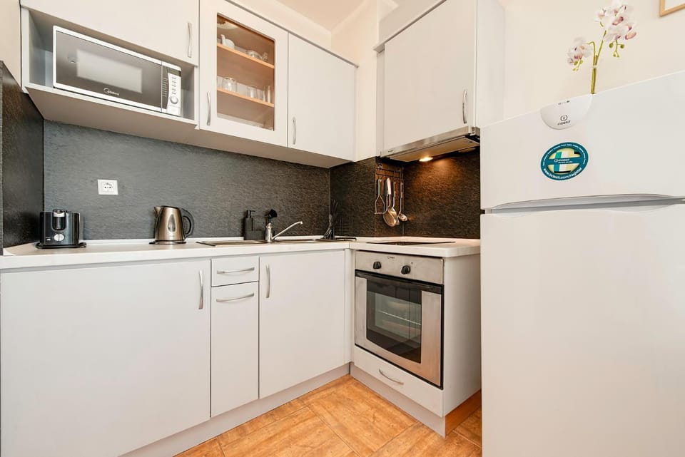 Kitchen or kitchenette, Living room, microwave, oven, stove, toaster