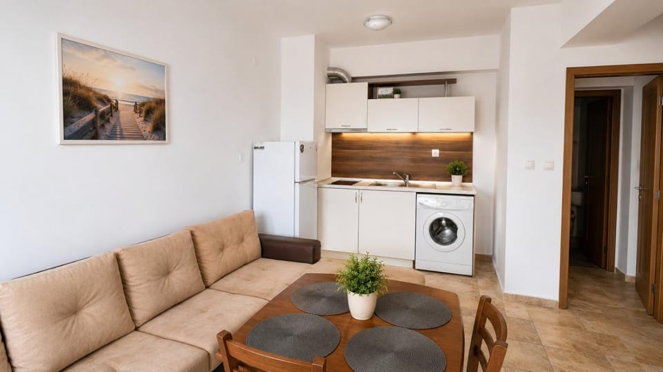 Kitchen or kitchenette, Living room, Seating area, Dining area, stove, washing machine