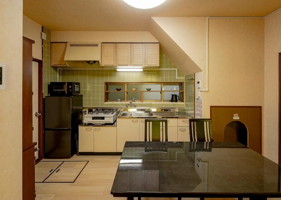 Kitchen or kitchenette, stove