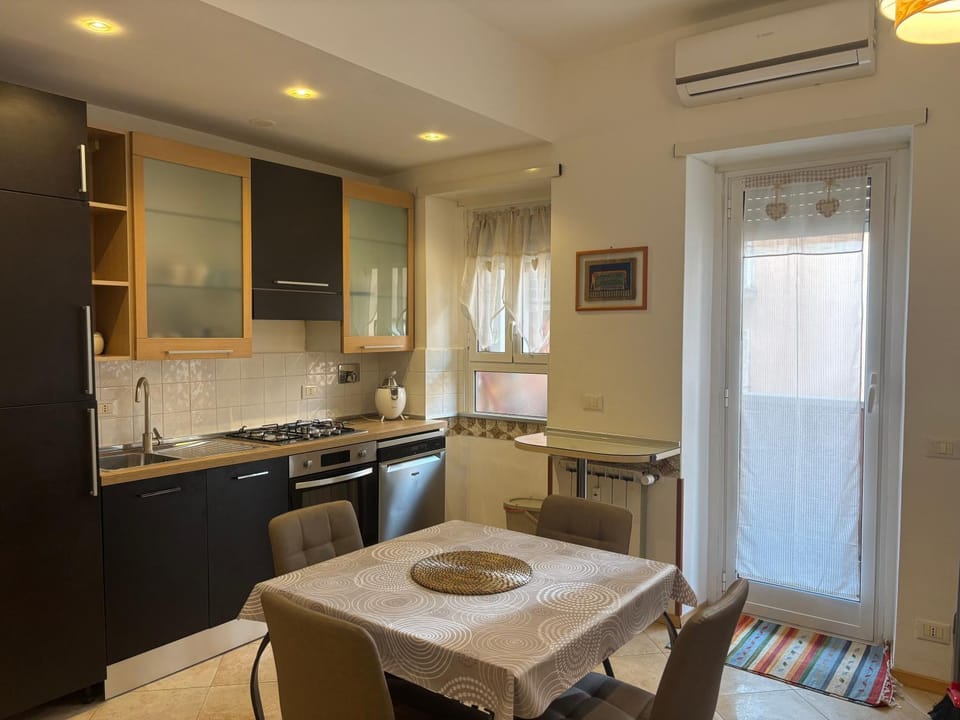Kitchen or kitchenette, Dining area, dishwasher, oven, stove, air conditioner