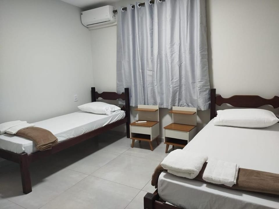 Apartamento novo 1o andar central com ar condicionado garagem tv smart Apartment in Montes Claros