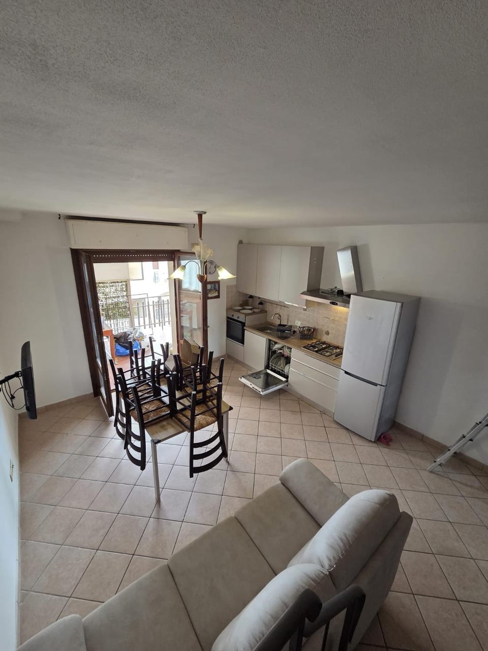 Kitchen or kitchenette, dishwasher, oven, stove