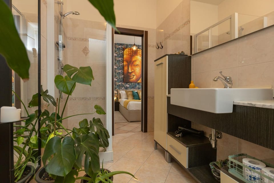 Toilet, Bed, Bathroom, Decorative detail, Decorative detail, towels, towels