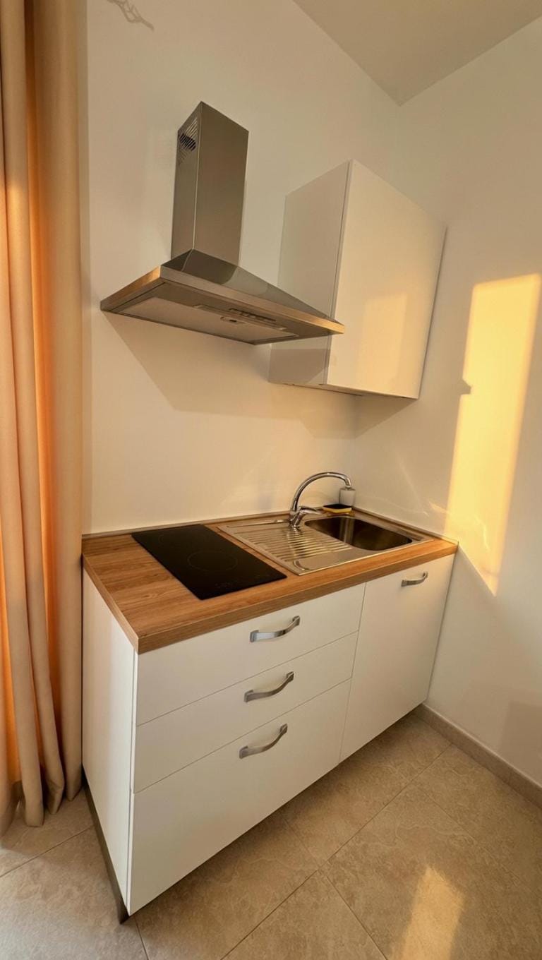 Kitchen or kitchenette, stove