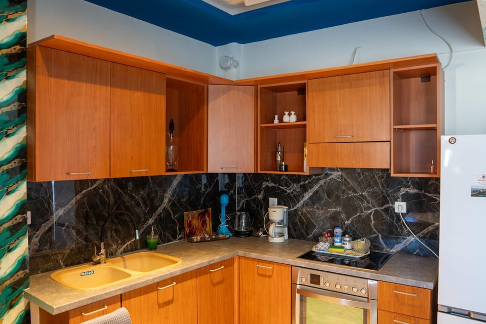 Kitchen or kitchenette, oven, stove