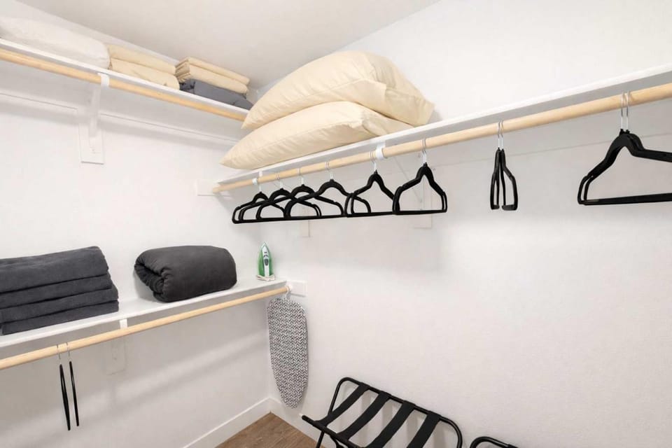 flat iron, towels, wardrobe