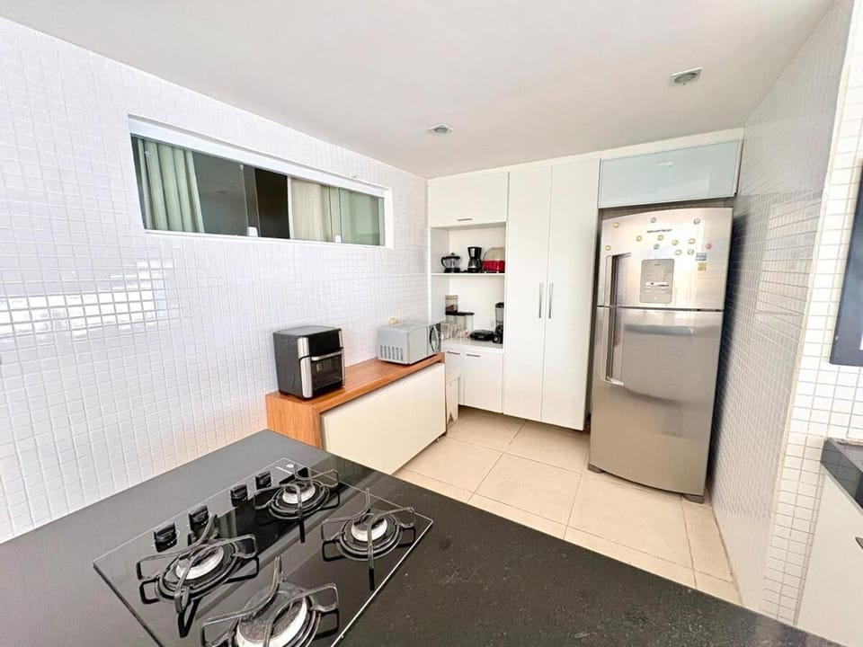Kitchen or kitchenette, stove, toaster