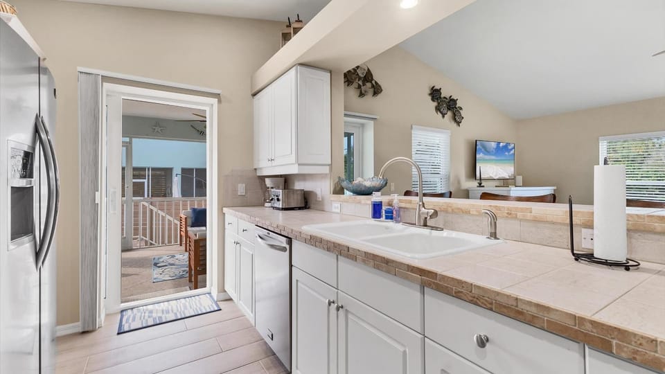 Seaside Sanctuary - private deeded beach access Pelican Shores Villa in Manasota Key