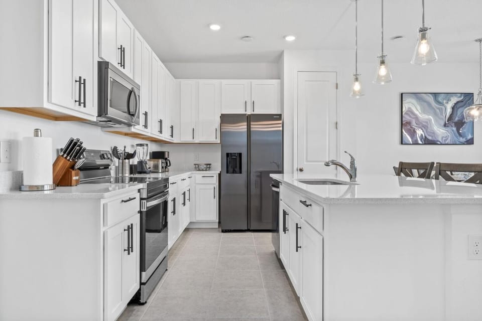 Kitchen or kitchenette, dishwasher, oven, stove, toaster, kitchen