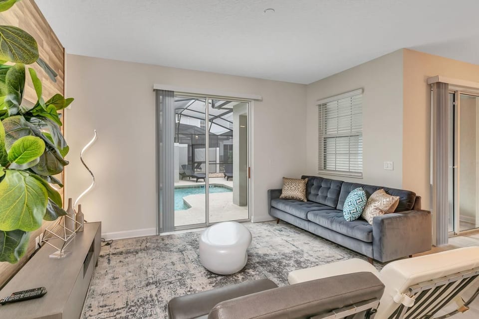 Living room, Seating area, Pool view