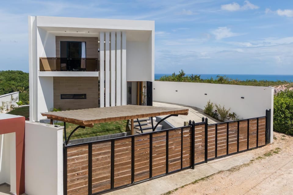 Property building, Patio, Natural landscape, Bird's eye view, Garden, View (from property/room), Sea view, Parking