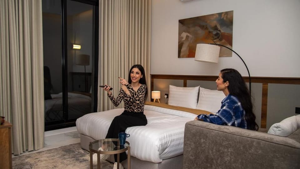 Bed, Seating area, Bedroom