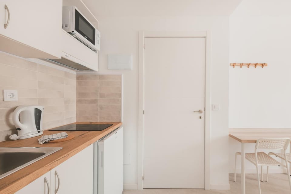 Kitchen or kitchenette, stove, toaster