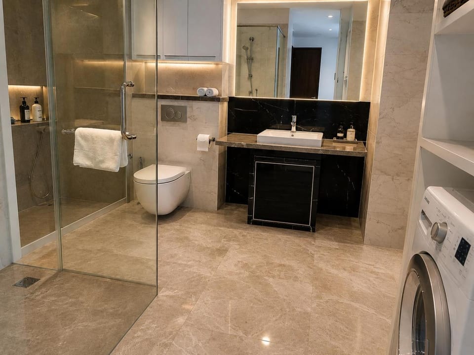 Shower, Toilet, Bathroom, towels, washing machine, dryer