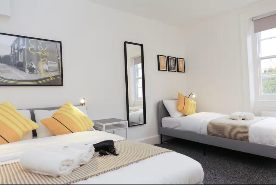 Bed, Photo of the whole room, Bedroom, hair dryier, towels