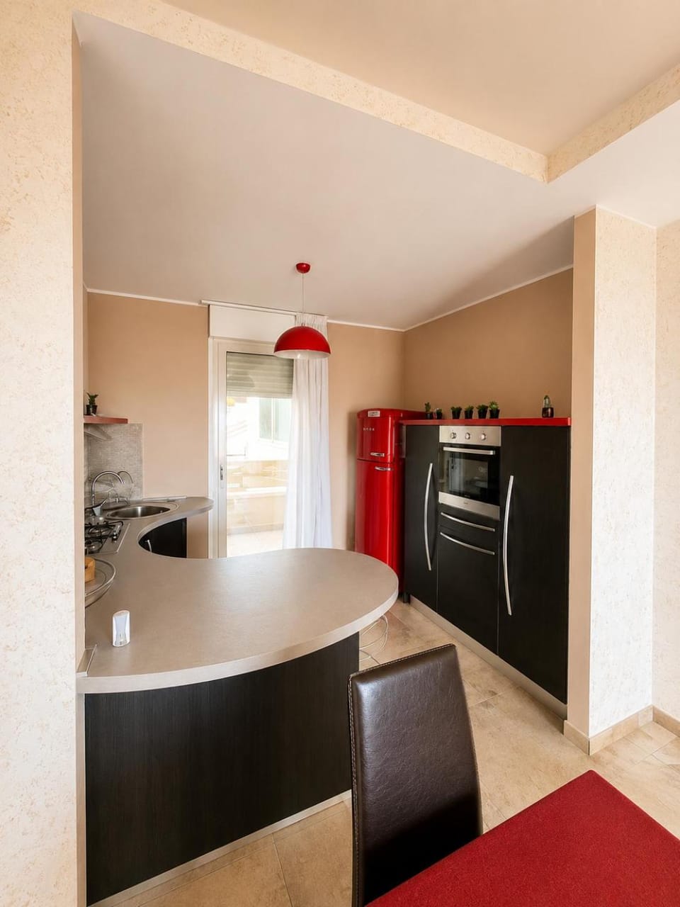 Kitchen or kitchenette, oven