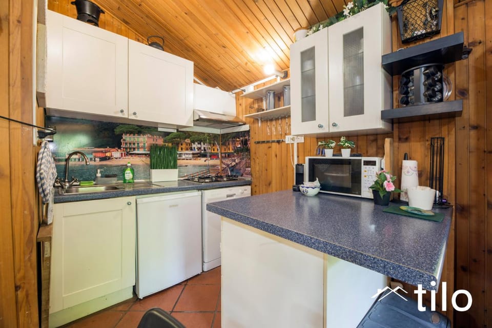 Kitchen or kitchenette, oven, stove, toaster