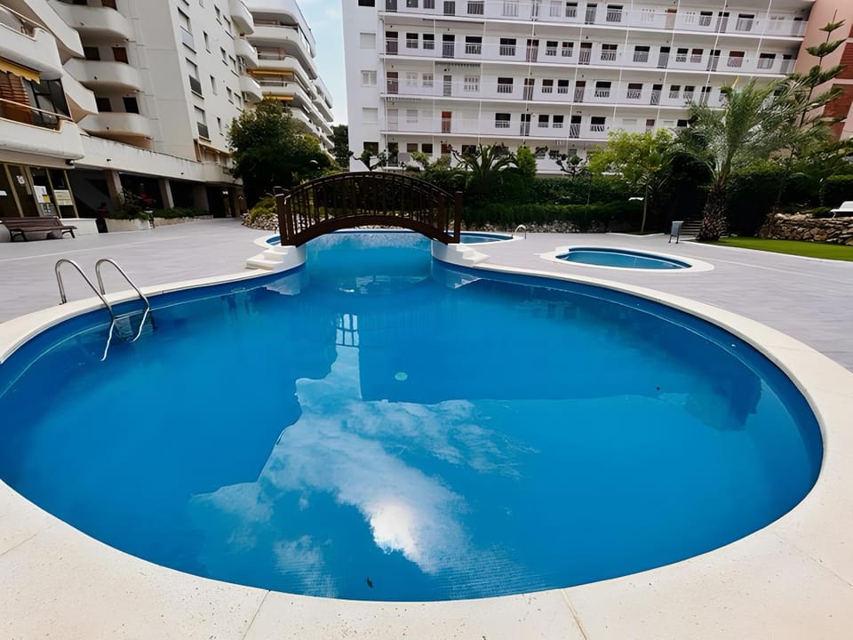 Property building, Living room, Swimming pool