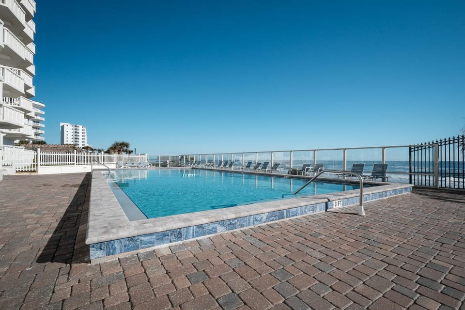 New Listing! Direct Oceanfront 2-2 Huge Private Balcony Beachfront Pool Garage Apartment in Ormond By The Sea