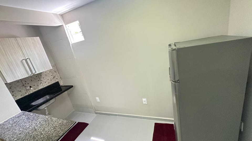 Kitchen or kitchenette, minibar