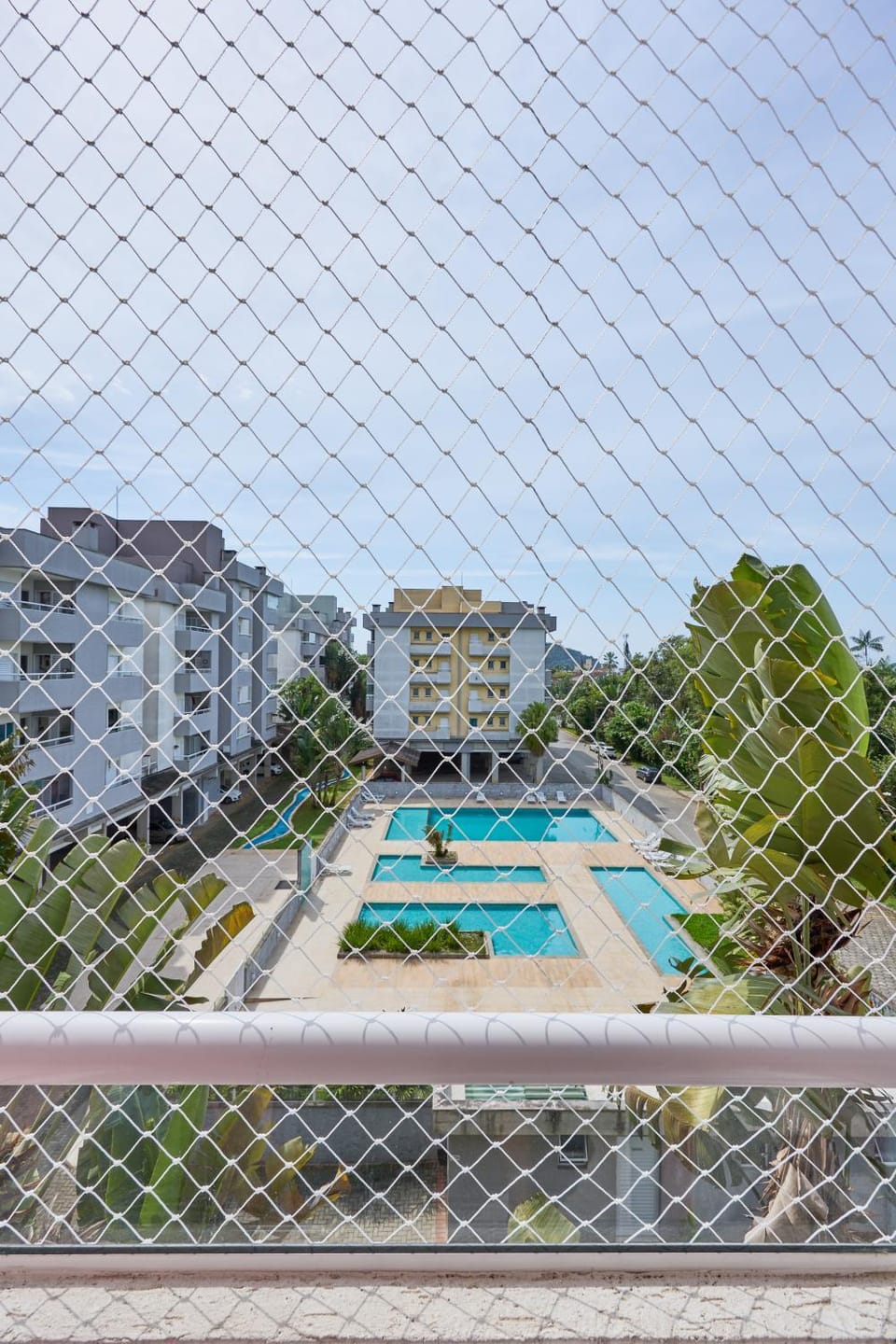 Property building, Day, Pool view, Swimming pool, sunbed