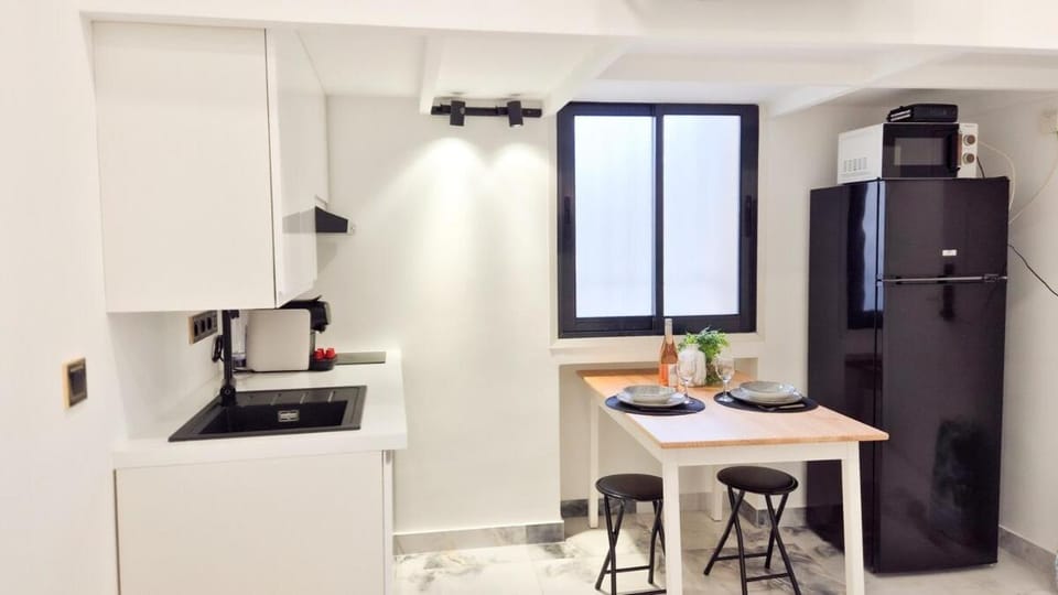 Kitchen or kitchenette, stove