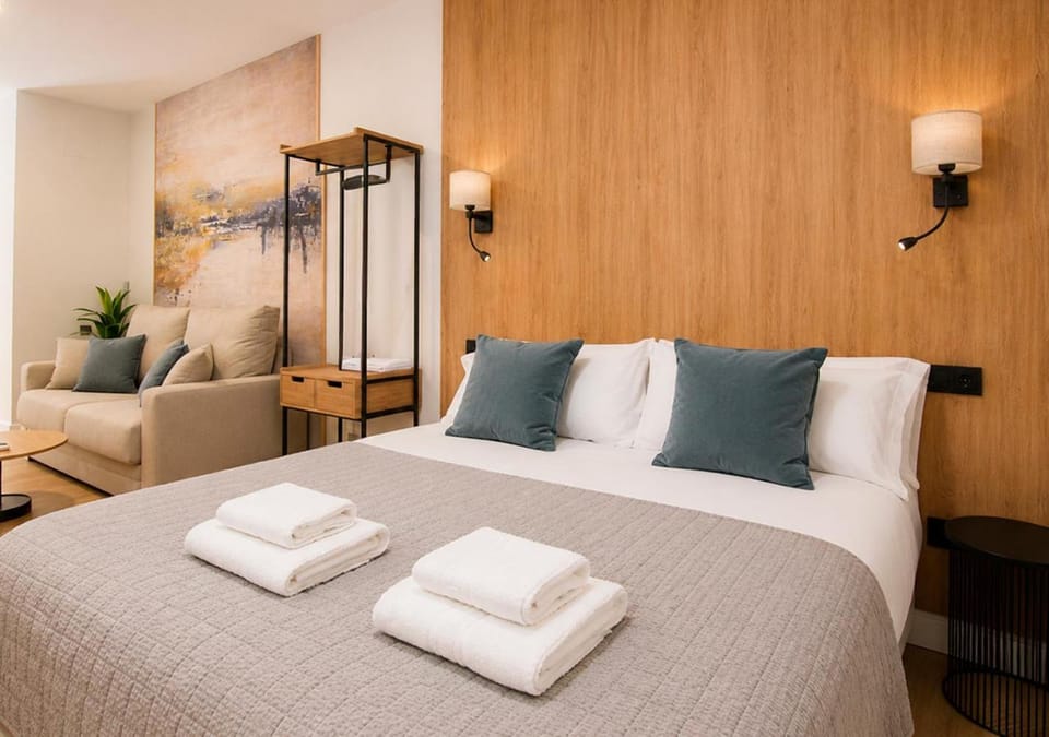 Bed, Living room, Seating area, Bedroom, towels, wardrobe