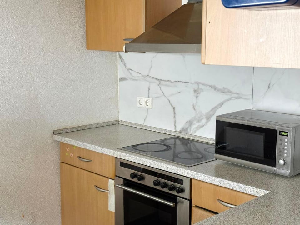 Kitchen or kitchenette, stove