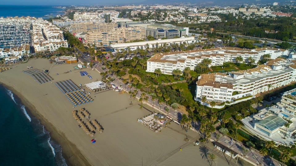 Property building, Nearby landmark, Day, Natural landscape, Bird's eye view, Beach