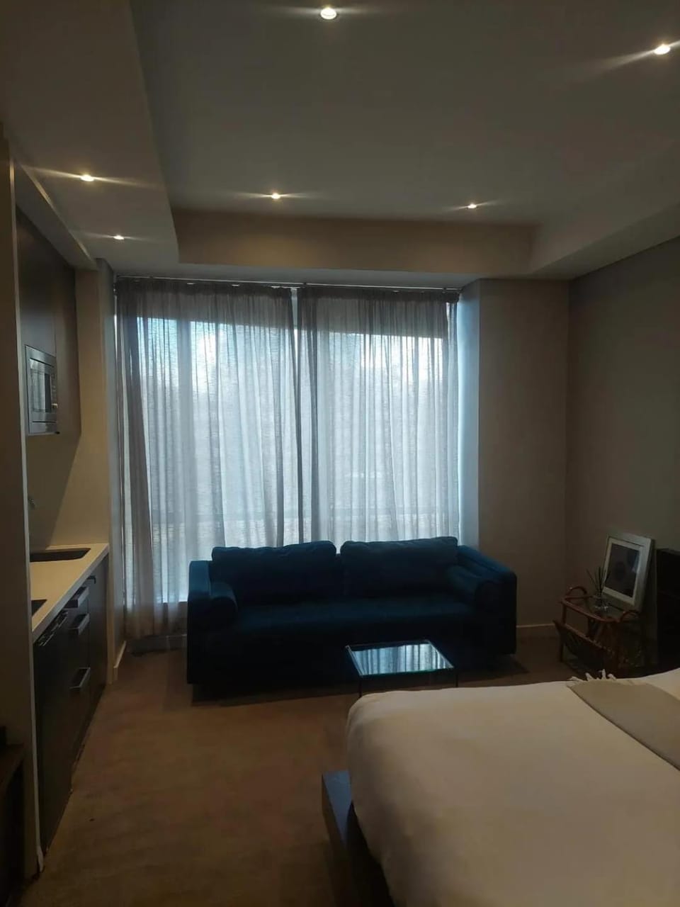 Bed, TV and multimedia, Living room, Photo of the whole room, Seating area