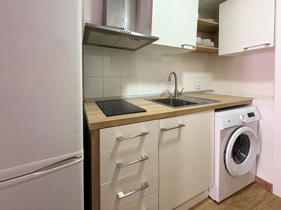 Kitchen or kitchenette, dishwasher, stove, washing machine, dryer