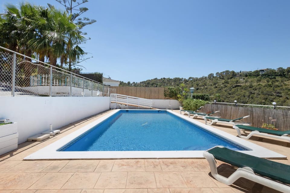Property building, Living room, Swimming pool