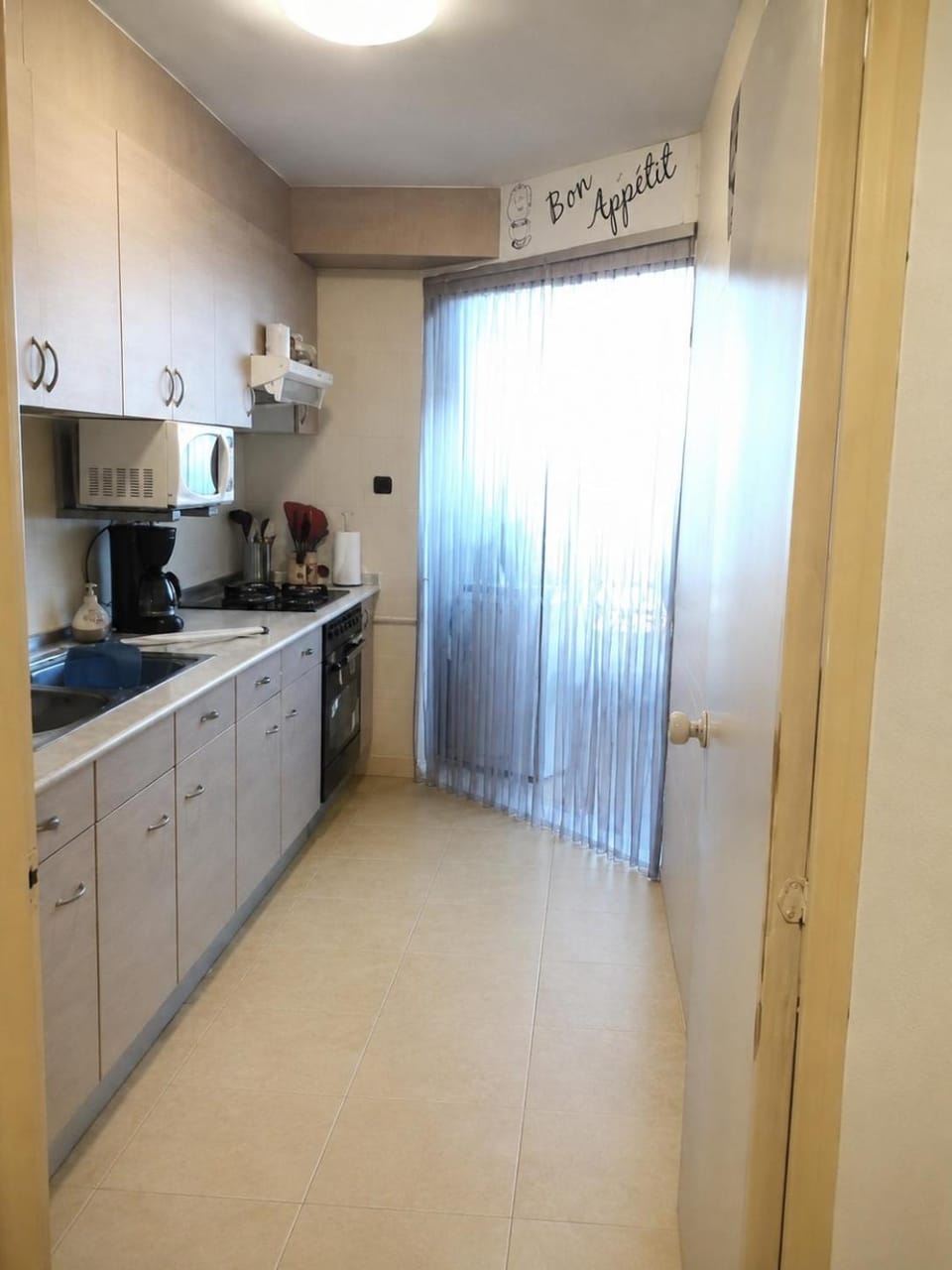 Kitchen or kitchenette, oven, stove