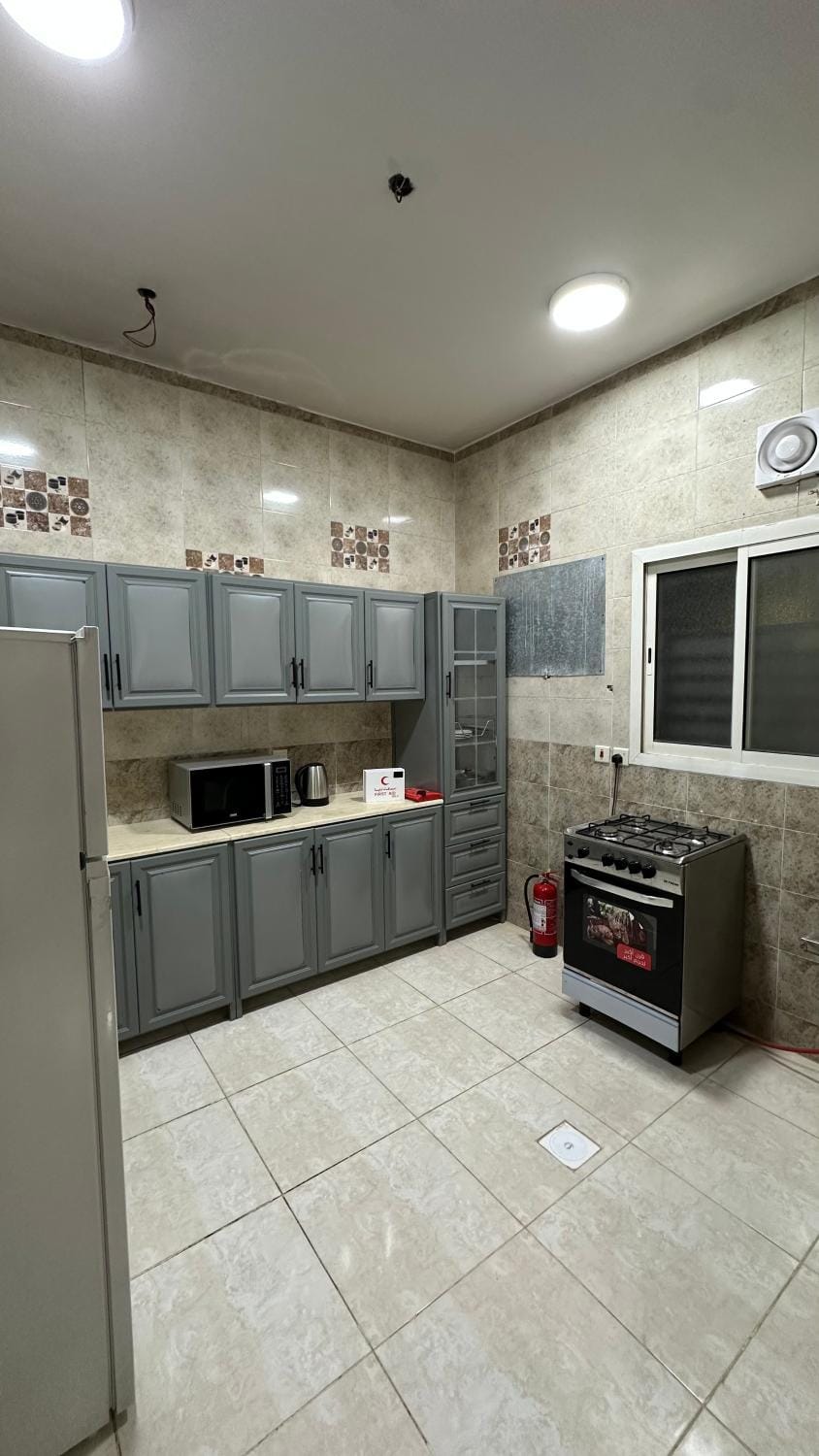 Kitchen or kitchenette, oven, stove