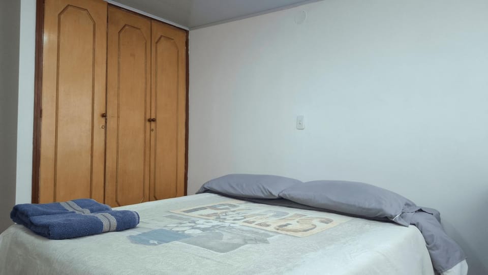 Bed, Photo of the whole room, Bedroom, towels, wardrobe