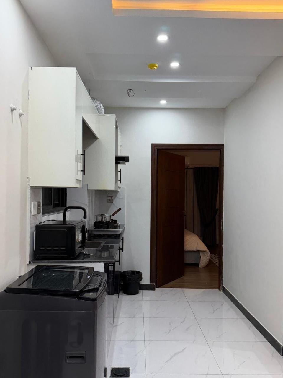 Kitchen or kitchenette, stove