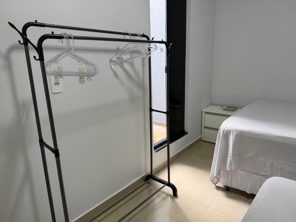Bed, Bedroom, hair dryier, towels, wardrobe