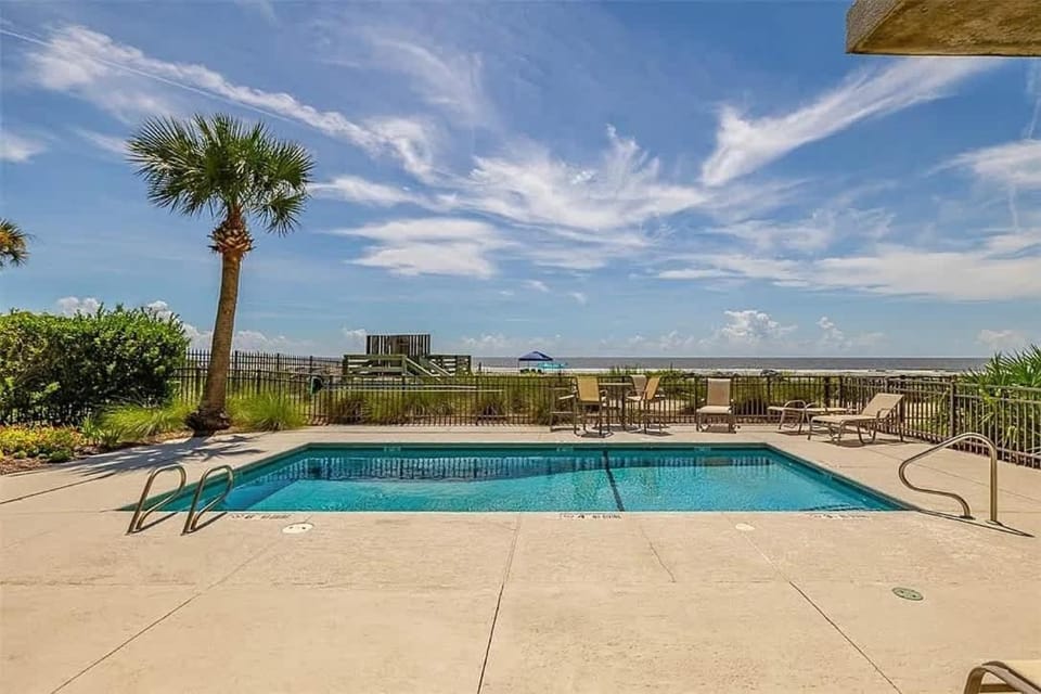 2 bedroom, 5 beds, 2 bath, beachfront Condo, Oceanfront Pool, Walk to Pier Village House in Saint Simons Island