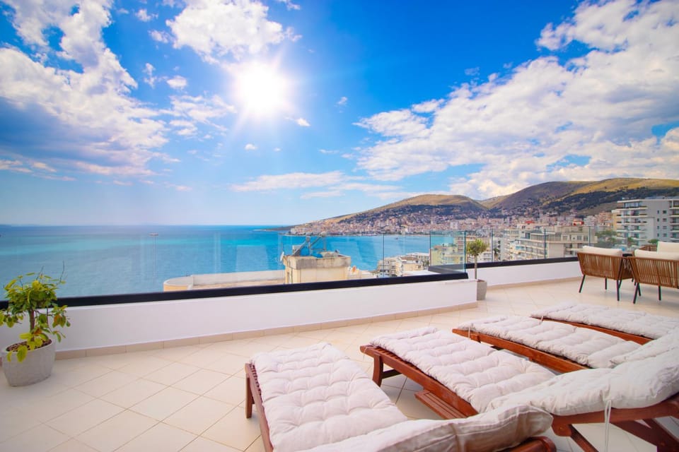 View (from property/room), Balcony/Terrace, Seating area, Sea view, sunbed