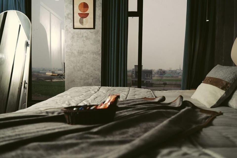 1 BHK Lunar Noir Starlight Ceiling & Moon Wall Bahria Lahore Apartment in Lahore