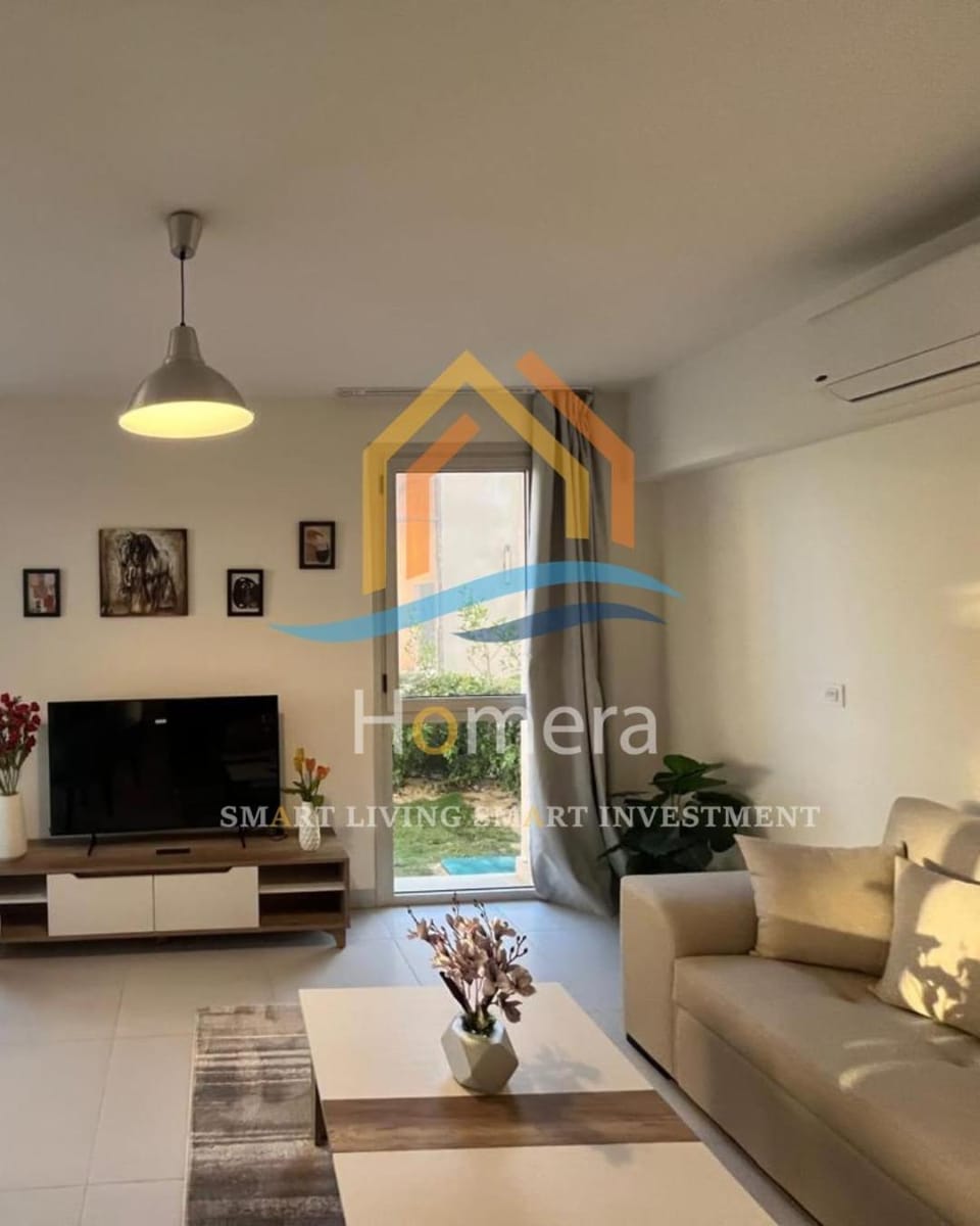 marassi marina 2 bedroom 2 bathroom terrace and garden looking swwiming lagoonn Chalet in Egypt